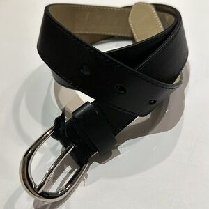 Black Vegan leather belt with silver tone buckle fits approximately 31-36”